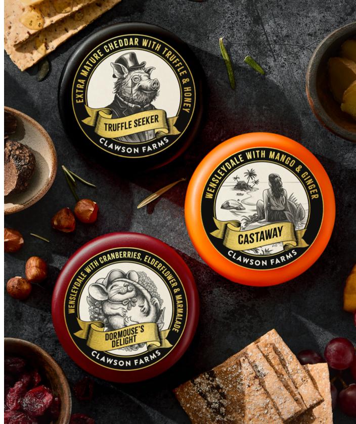 Clawson Farms introduced six new flavored cheese wheels under its new range of wax truckles..jpg