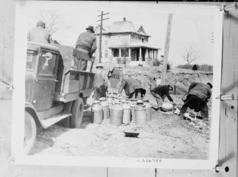 Dairy farmers dumping milk in 1933 at unknown location. Contributed: U.S. Library of Congress